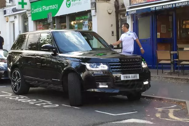 PAY-John-Terry-leaves-a-kebab-shop-in-Esher-High-Street-whilst-parked-in-disabled-bay.jpg