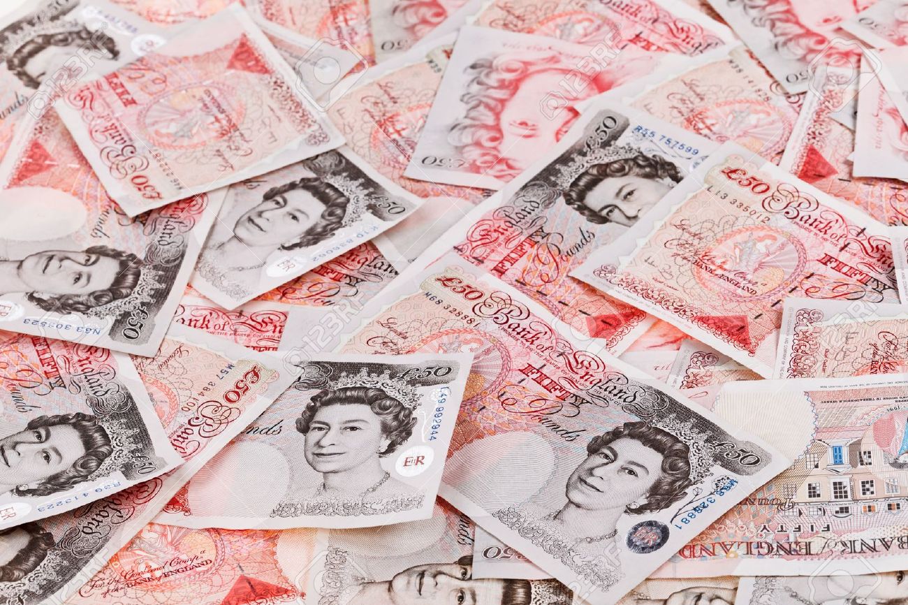 10928372-50-pound-sterling-bank-notes-closeup-view-business-background-Stock-Photo.jpg